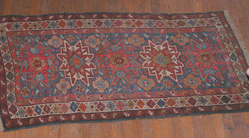 Appraisal: Caucasian Kazak Throw Rug Unknown Wool Fiber x inches Apparently