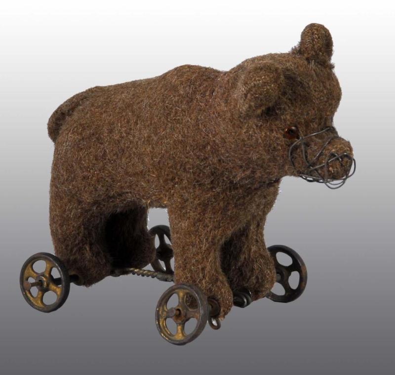 Appraisal: Bear on Wheels Floor Toy Description German Straw-filled with wire