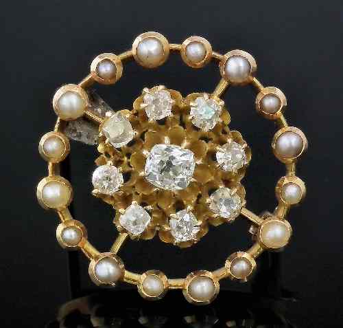 Appraisal: A gold coloured metal mounted diamond and seed pearl garland