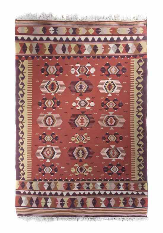 Appraisal: A Kilim Wool Rug having repeating linear and geometric decoration