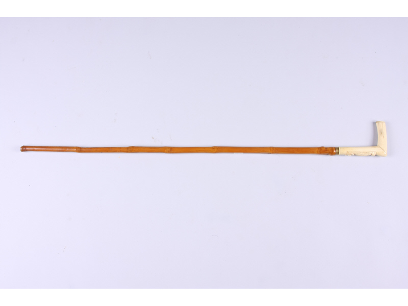 Appraisal: Antique Bone-Handled Cane finely carved with high relief floral motif