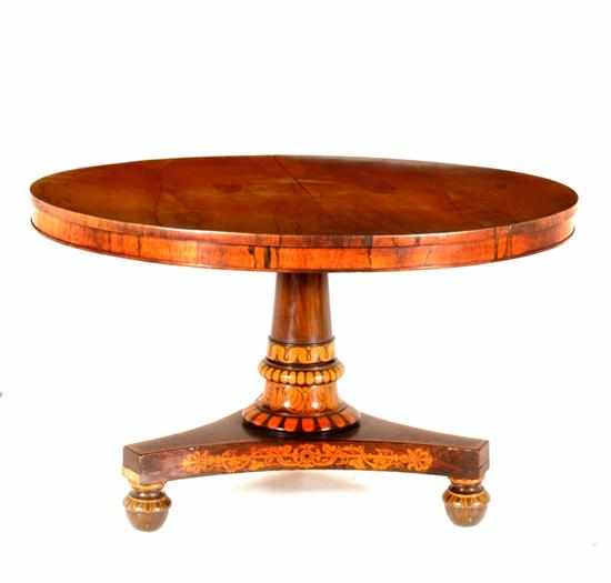 Appraisal: Regency paint-decorated rosewood center table circa circular top with conforming