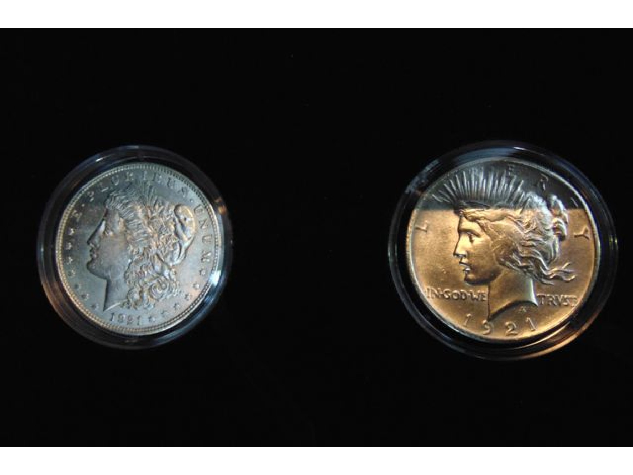 Appraisal: A Morgan Silver Dollar and a High Relief Peace Silver