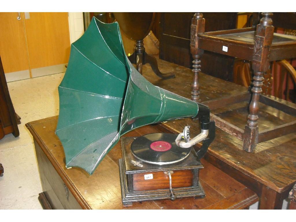 Appraisal: Table-top wind-up gramophone with a square stained wooden case and