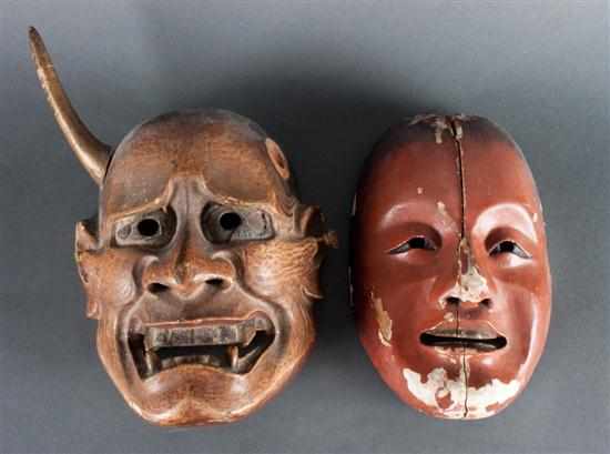 Appraisal: Two Japanese carved and painted wood masks th Century each