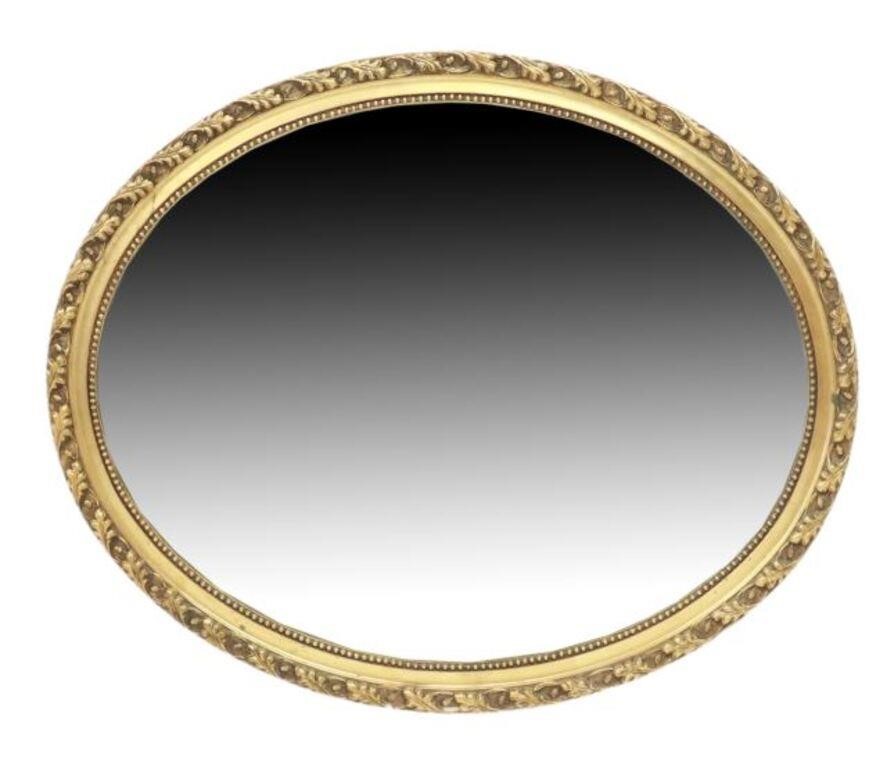 Appraisal: Italian giltwood oval mirror th c frame with oak leaves