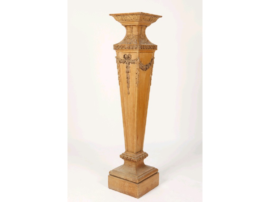 Appraisal: A NEO-CLASSICAL STYLE PINE TORCHERE the square top above leaf