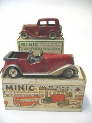 Appraisal: Two Minic clockwork toys comprising Ford Saloon maroon with petrol