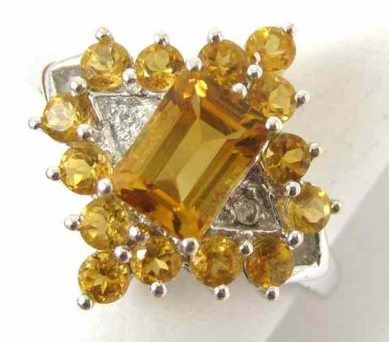 Appraisal: CITRINE DIAMOND AND TEN KARAT GOLD RING set with two