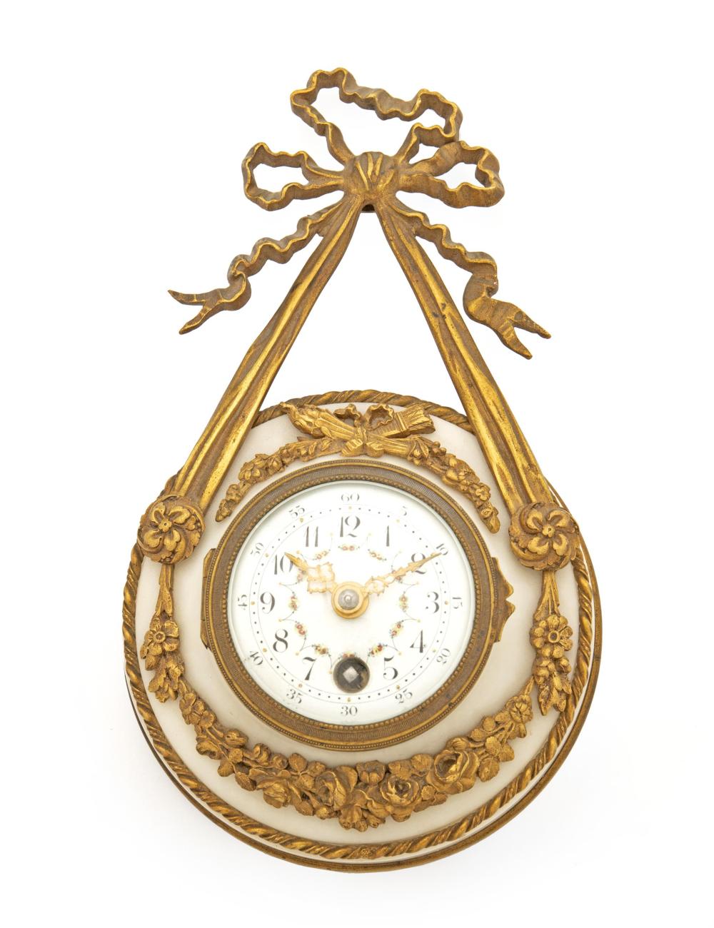 Appraisal: A petit French wall clock Circa s The white marble