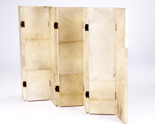 Appraisal: STYLE OF JEAN-MICHEL FRANK Seven-panel low screen in parchment-covered oak