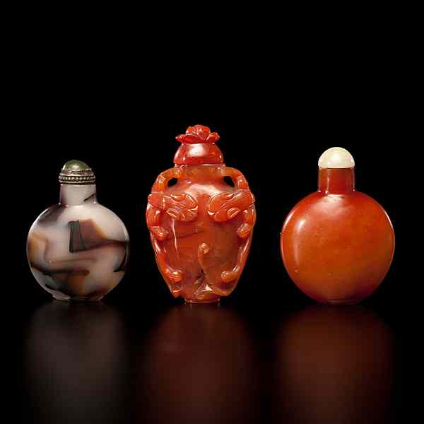 Appraisal: Chinese Snuff Bottles Chinese th century Three snuff bottles including