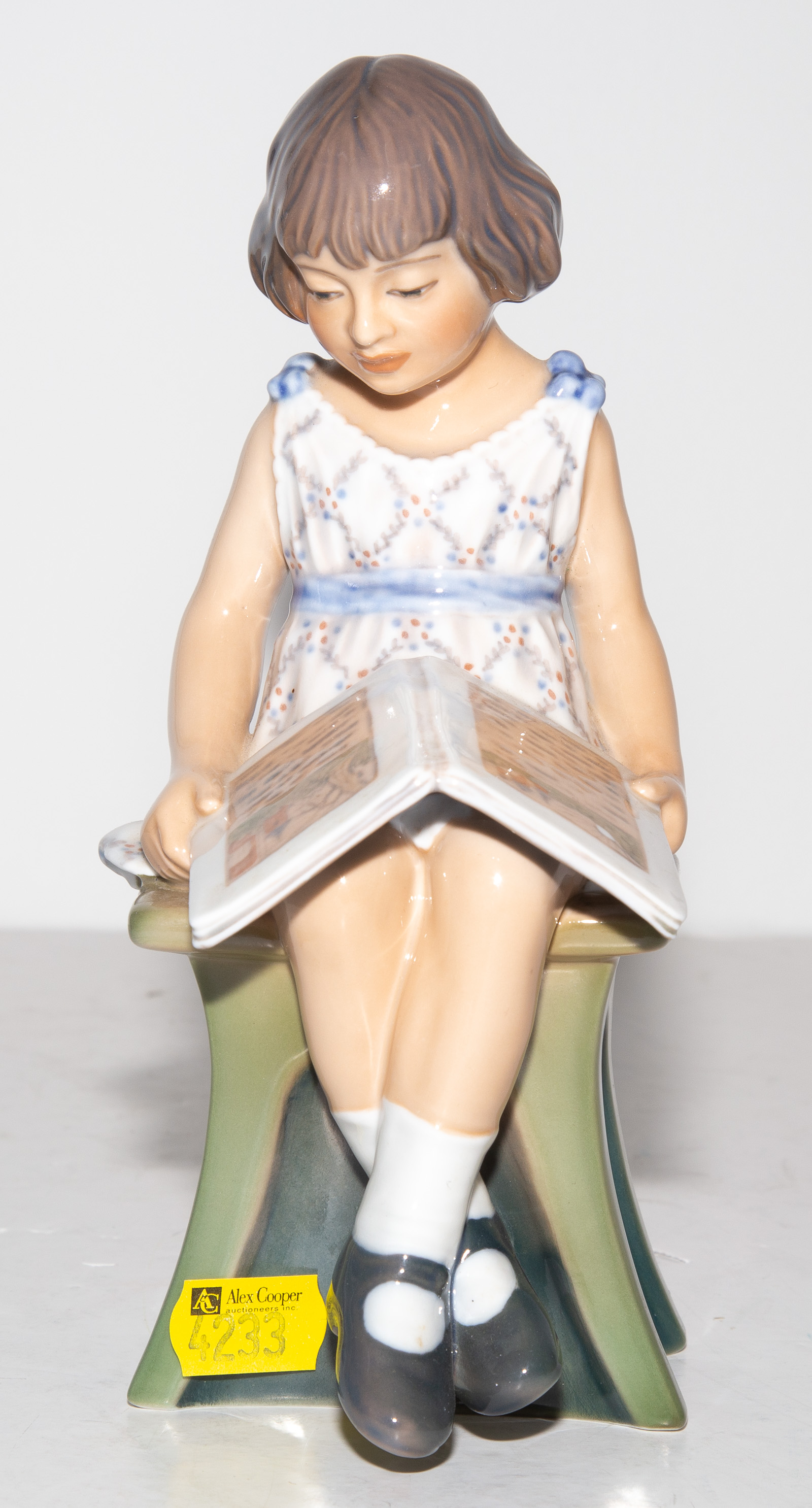 Appraisal: DAHL JENSEN COPENHAGEN PORCELAIN FIGURE Girl with a Picture Book