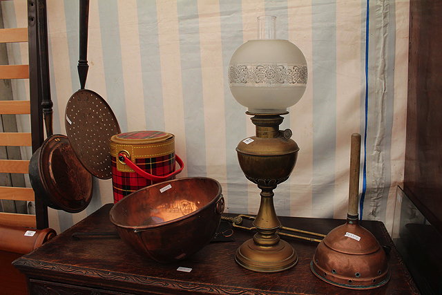 Appraisal: AN OLD BRASS OIL LAMP together with a pair of