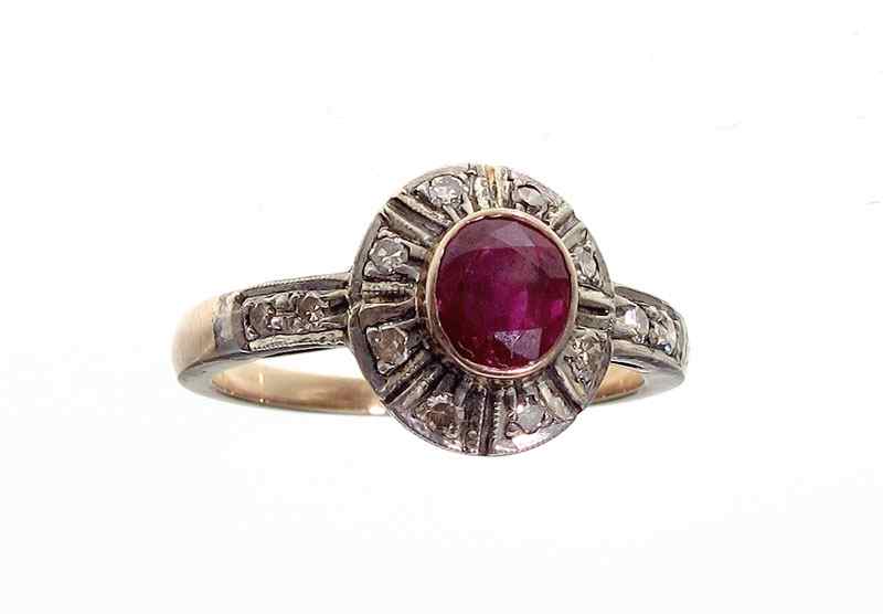 Appraisal: ANTIQUE STYLE RUBY AND DIAMOND RING K yellow gold and