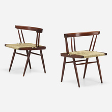 Appraisal: George Nakashima GRASS-SEATED CHAIRS PAIR Nakashima StudioUSAAmerican black walnut sea