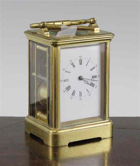 Appraisal: A French brass carriage clock with enamelled Roman dial and