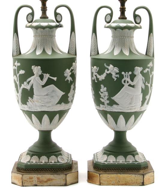 Appraisal: Pair of Jasperware Urns the urn decorated with reserves of