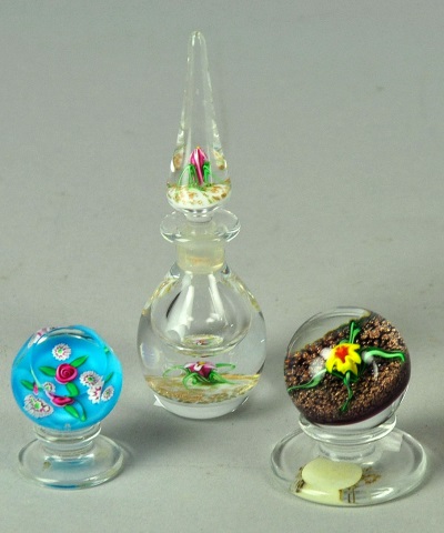 Appraisal: Two Small Paperweights on StandsAlong with a paperweight perfume bottle