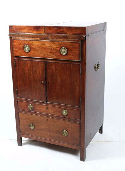 Appraisal: A GEORGE III MAHOGANY WASHSTAND the lifting lid to the