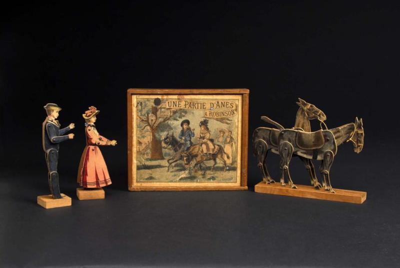 Appraisal: Wooden Man Woman on Horses Set Description French Late th