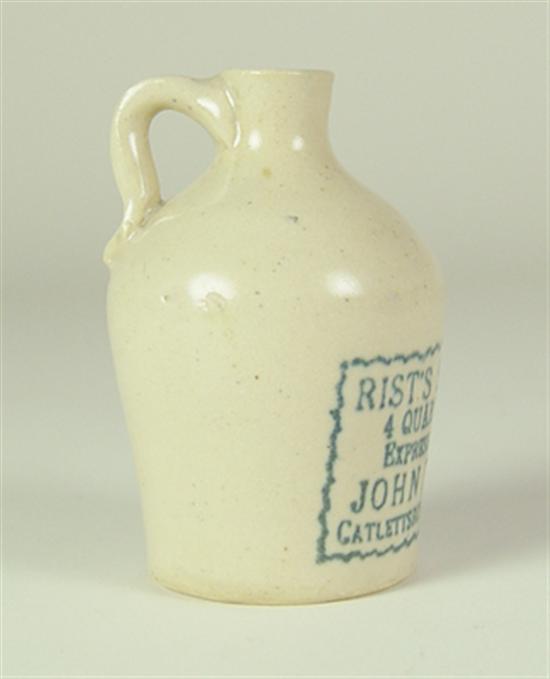 Appraisal: Miniature Whiskey Jug Circa Crockery jug with applied handle Tan