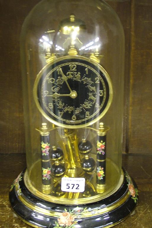 Appraisal: Herr torsion clock with passing strike the black dial gilded