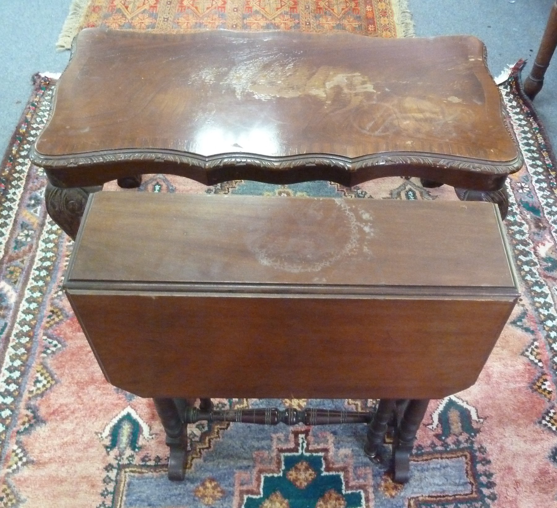 Appraisal: An Edwardian Sutherland table cm wide and a mahogany coffee