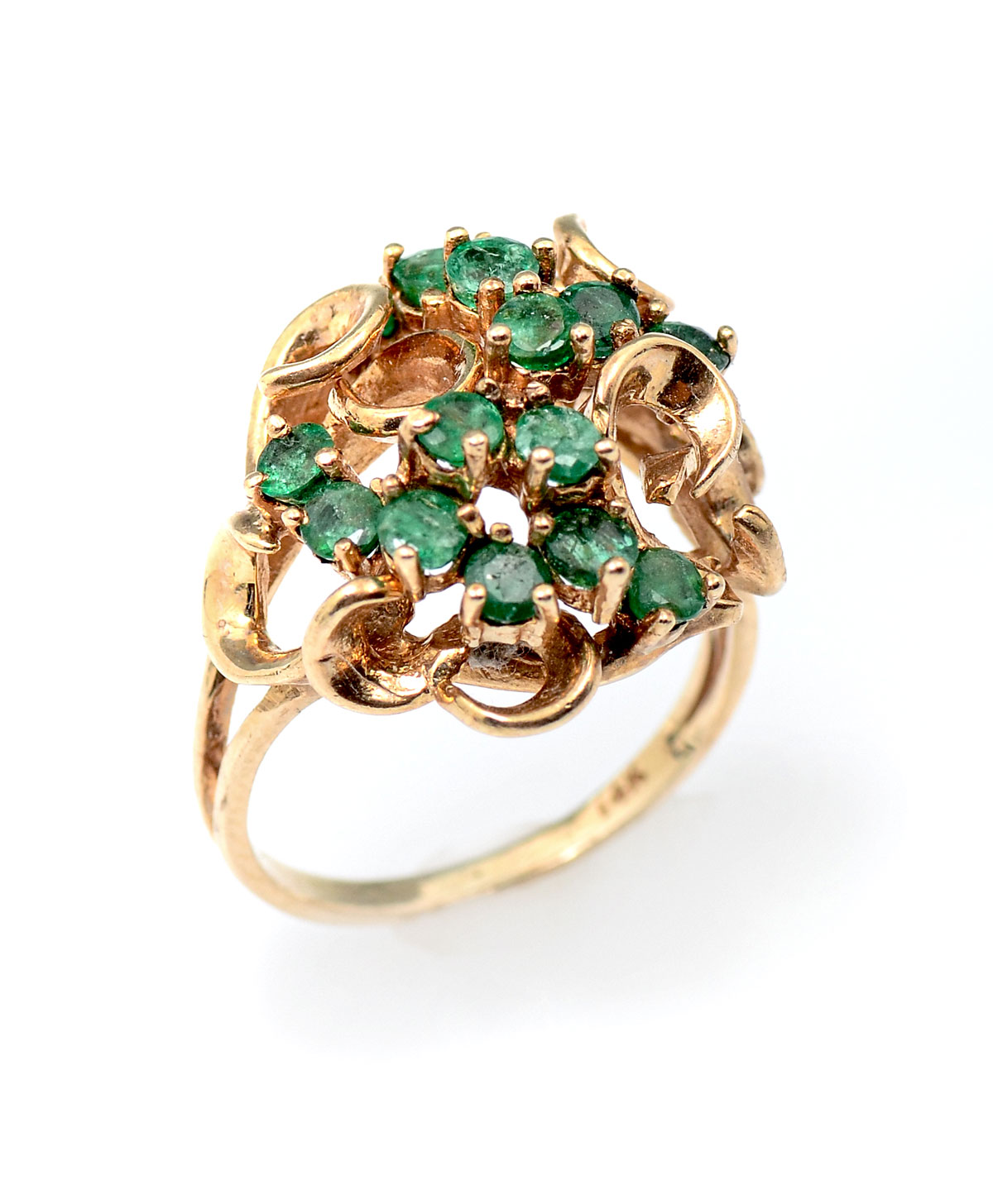 Appraisal: K EMERALD RING K yellow gold ring contains round mixed