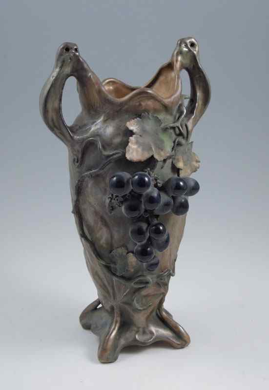 Appraisal: TURN TEPLITZ IRIDESCENT GLAZED VASE Naturalistic grape cluster and leaf