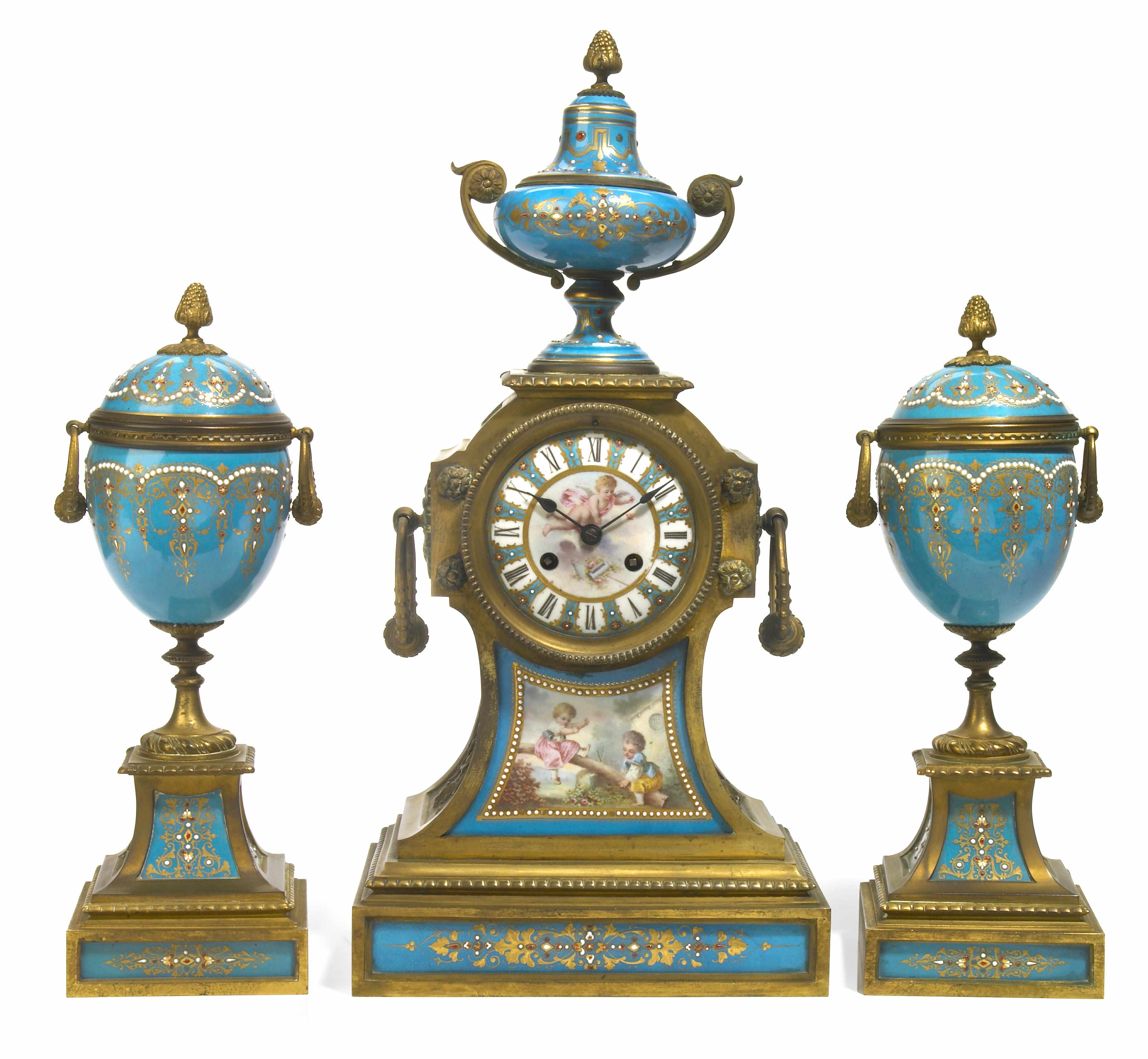 Appraisal: A French gilt bronze and 'jeweled' porcelain clock garniture late