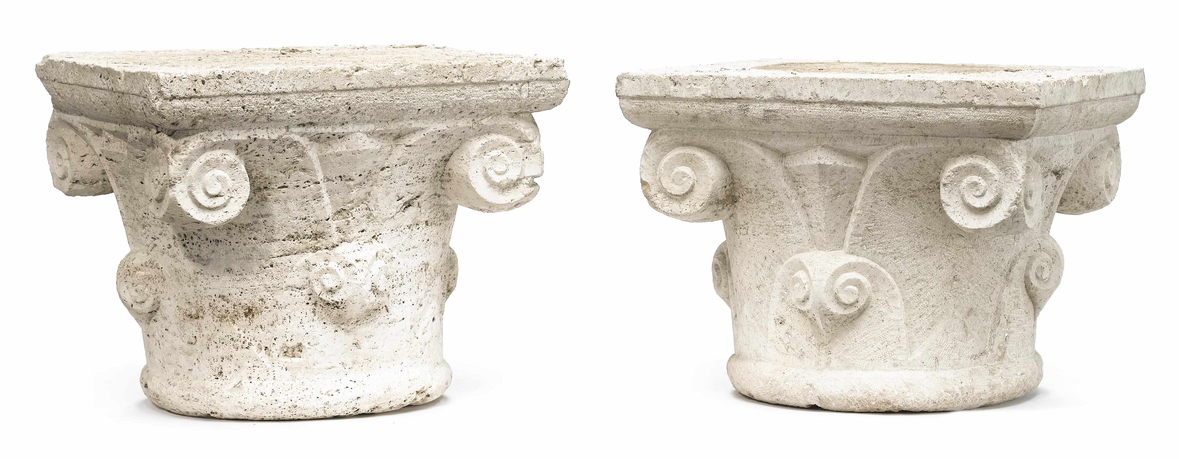 Appraisal: A pair of Romanesque carved stone capitals with volute scrolls