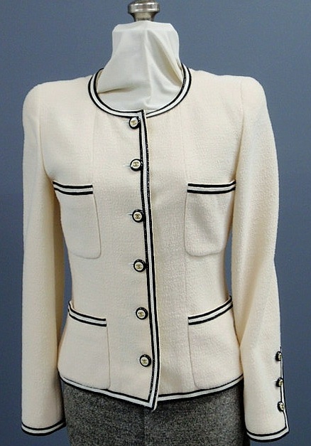 Appraisal: Chanel Boutique cream wool blend boucl jacket mid-length with black