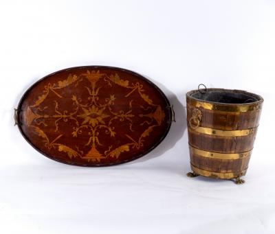 Appraisal: An Edwardian mahogany and inlaid tray of oval twin handled