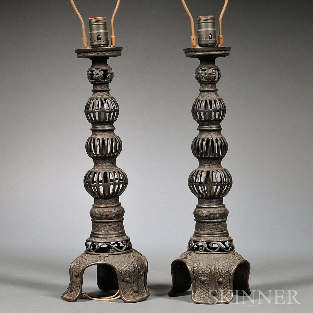 Appraisal: Pair of Bronze Lamps China three-tiered structure with three globular