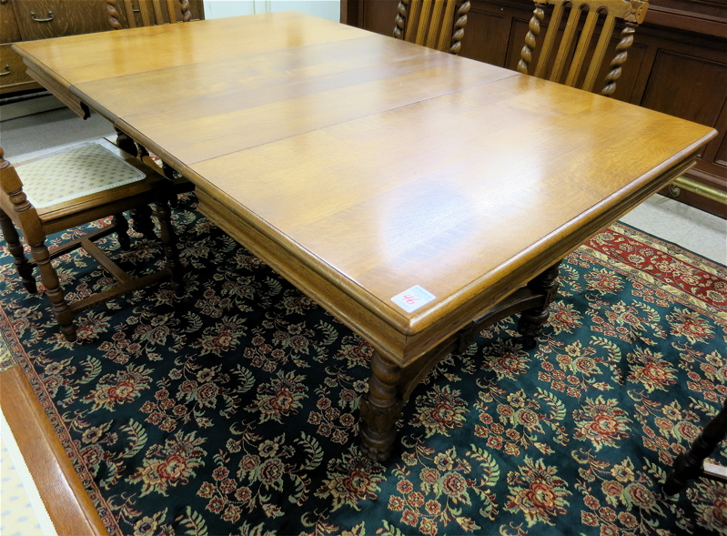 Appraisal: SQUARE OAK DINING TABLE WITH SIX LEAVES American c the