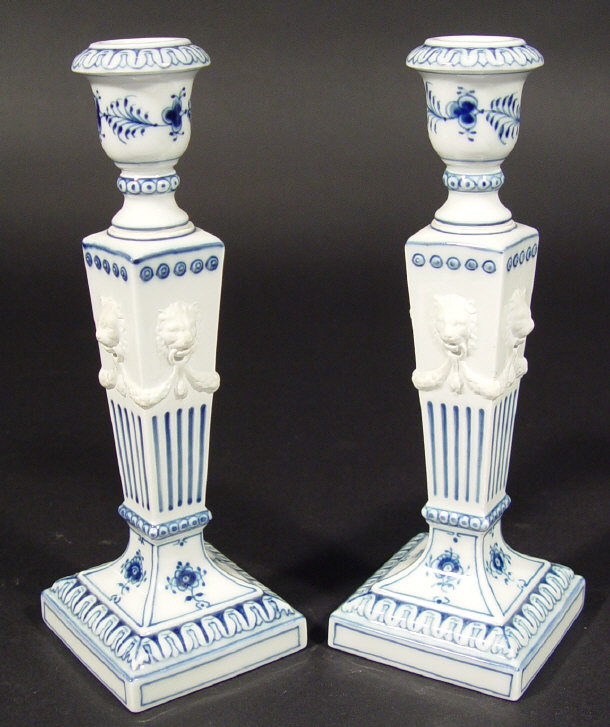 Appraisal: Pair of Royal Copenhagen china candlesticks relief moulded with lion