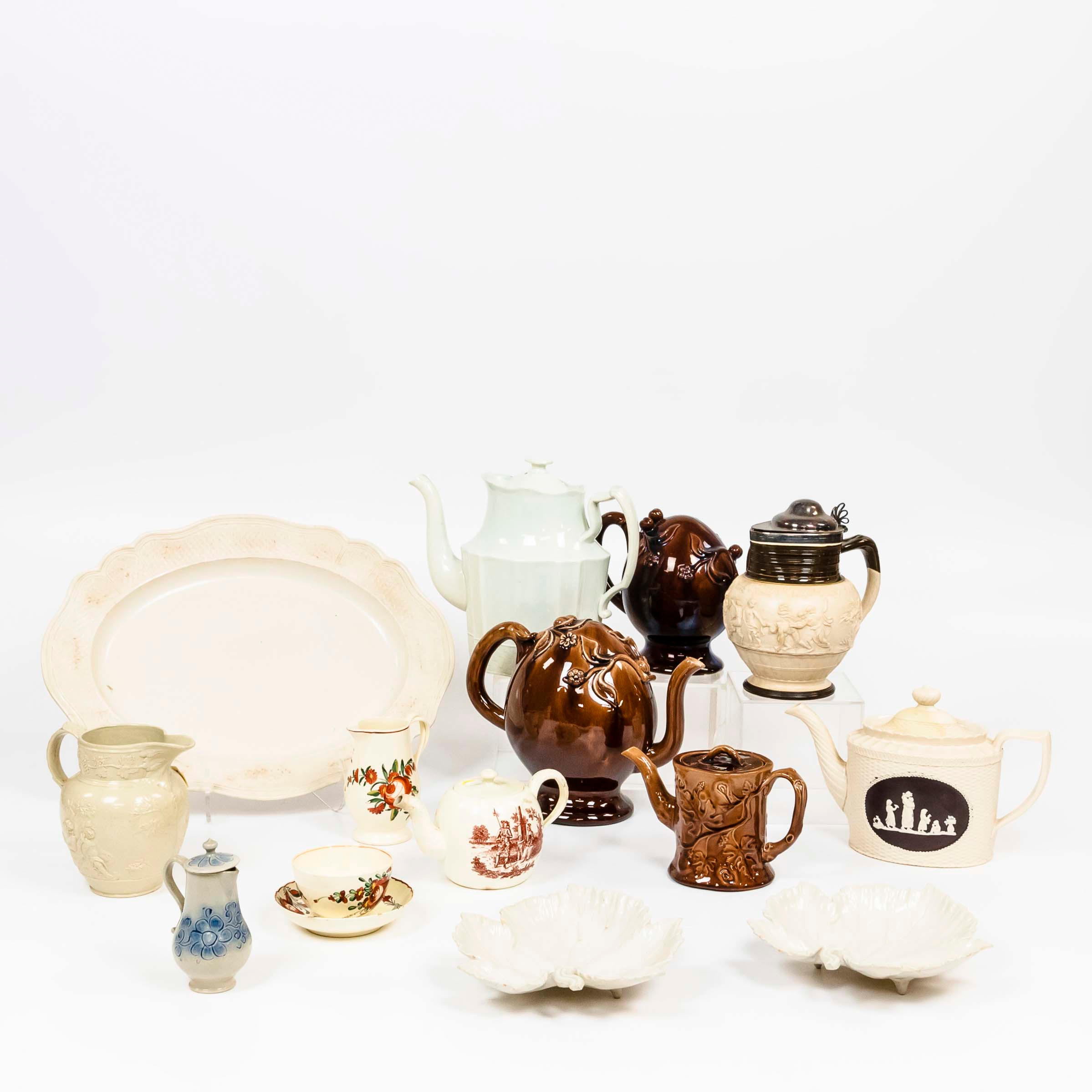 Appraisal: FOURTEEN ENGLISH POTTERY ITEMS including brown-glazed Chinese export teapots two