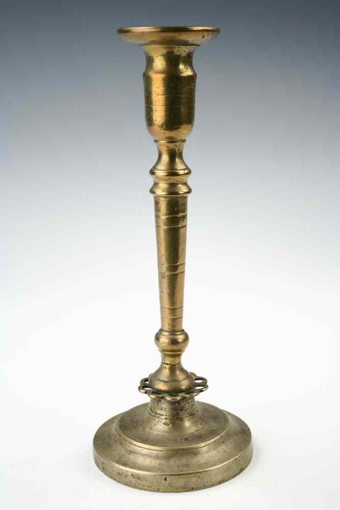 Appraisal: CANDLESTICK - th c cast brass candlestick with flared top