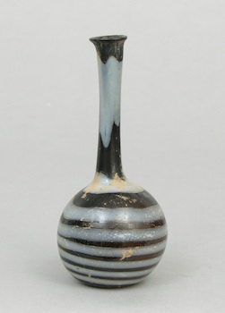 Appraisal: A Roman Glass Miniature Swirl Vase A very pretty dark