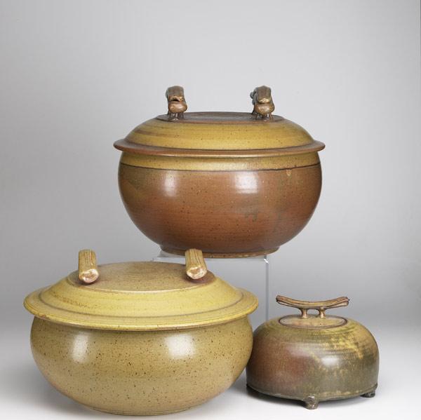 Appraisal: ROBERT CRYSTAL Two monumental stoneware covered bowls with double strap