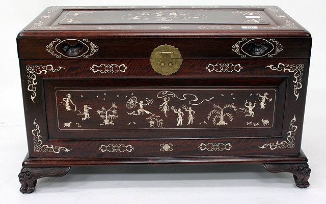 Appraisal: A SMALL ORIENTAL HARDWOOD CHEST with decorative bone inlay standing