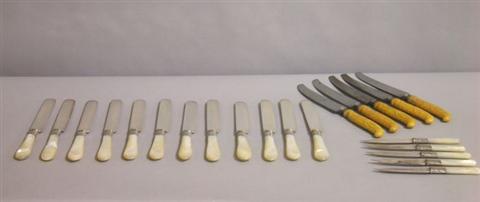 Appraisal: TWELVE MOTHER-OF-PEARL HANDLED KNIVES The blades marked Meriden Cutlery Co