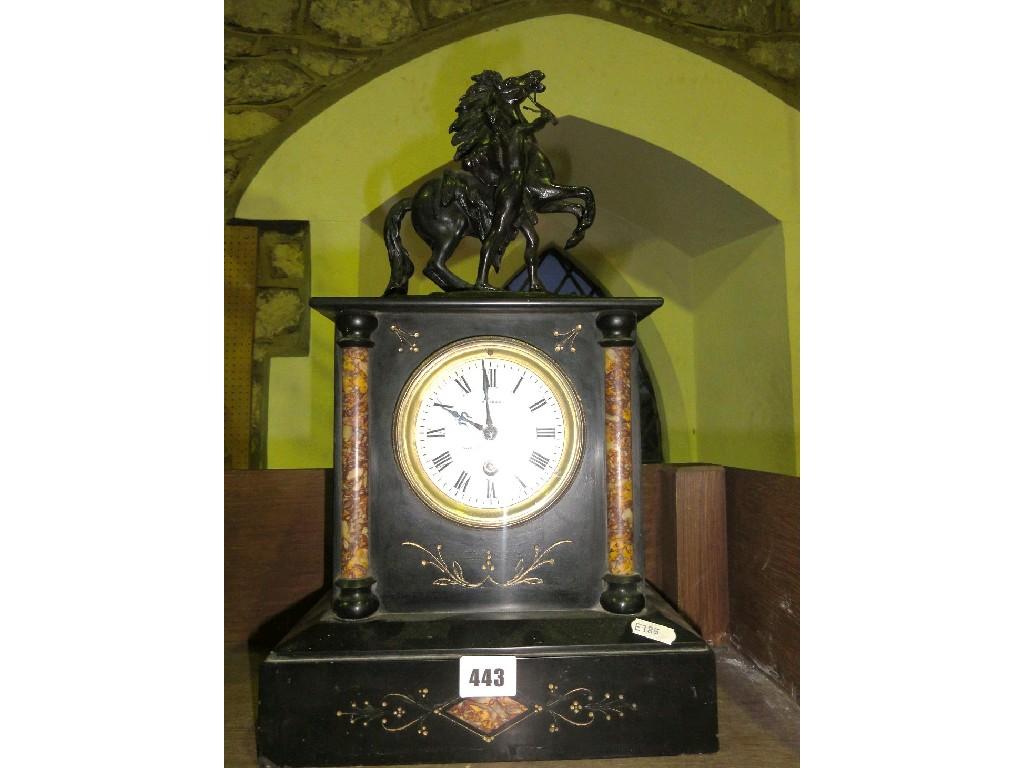 Appraisal: A Victorian black slate and polished marble mantle clock with