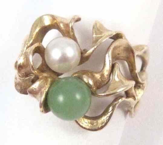 Appraisal: JADE PEARL AND FOURTEEN KARAT GOLD RING set with a