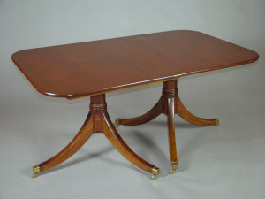 Appraisal: A Regency style mahogany twin pedestal dining table mid th