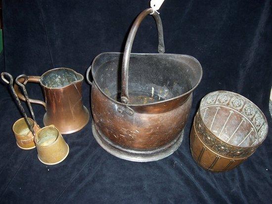 Appraisal: A copper jug a scuttle two brass cider measures etc