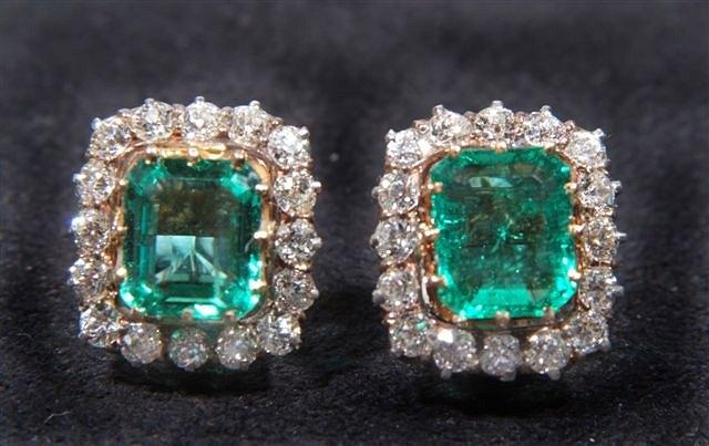 Appraisal: A PAIR OF EMERALD AND DIAMOND SET EAR CLIPS claw