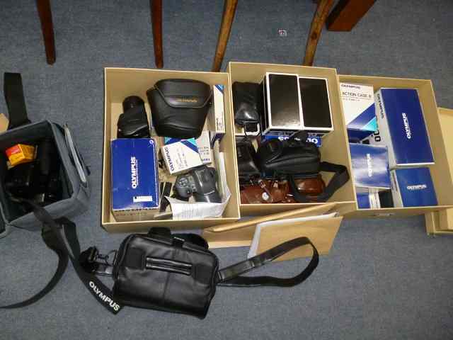 Appraisal: A QUANTITY OF VARIOUS OLYMPUS CAMERAS and camera accessories to