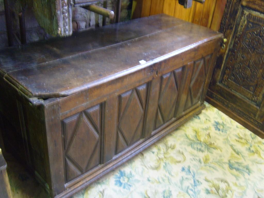 Appraisal: A Georgian oak coffer with rising lid the front elevation